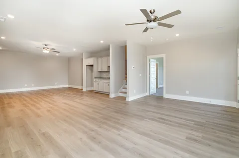 a bathroom with a sink toilet and a mirror