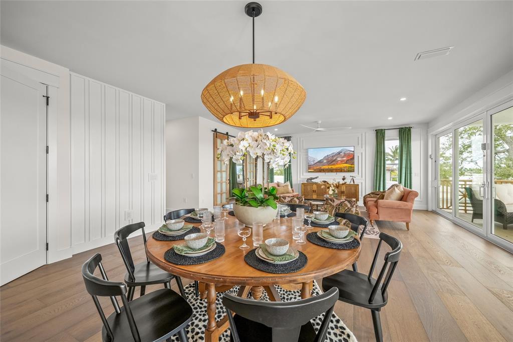 525 68th Street Holmes Beach, FL 34217 - Photo 16 of 52 a view of a dining room with furniture window and outside view