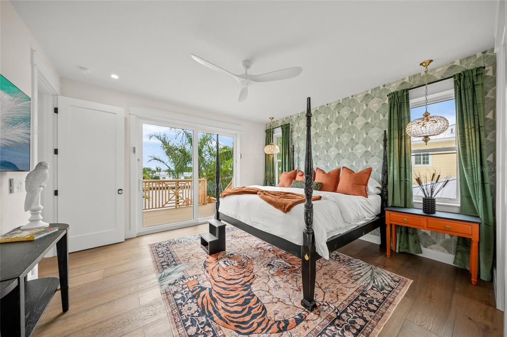 525 68th Street Holmes Beach, FL 34217 - Photo 21 of 52 a bed room with a bed and a window