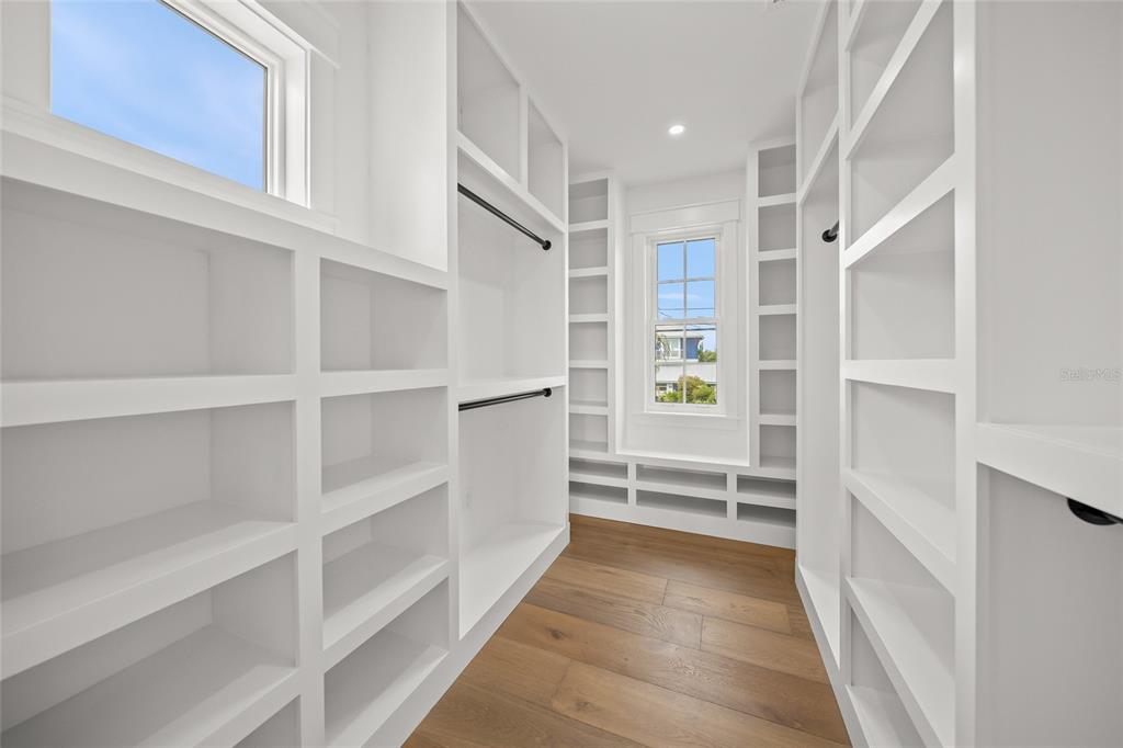525 68th Street Holmes Beach, FL 34217 - Photo 24 of 52 a view of walk in closet with empty racks