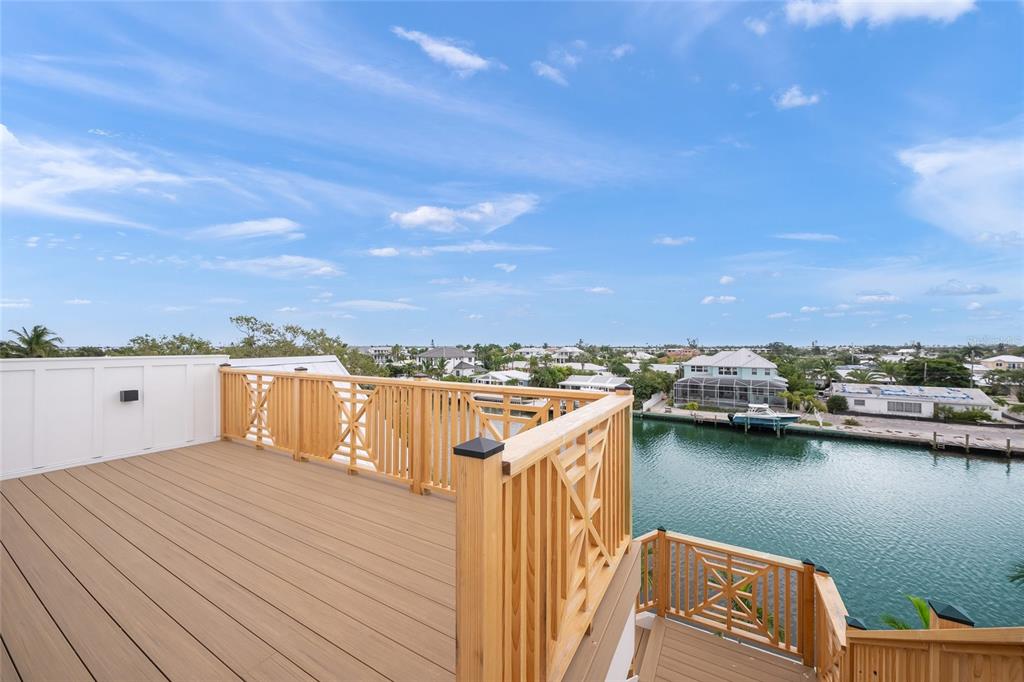 525 68th Street Holmes Beach, FL 34217 - Photo 38 of 52 a view of a terrace with a lake view