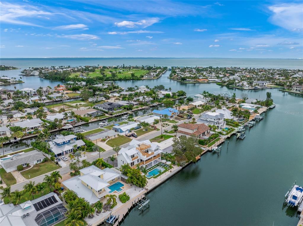 525 68th Street Holmes Beach, FL 34217 - Photo 52 of 52 an aerial view of residential houses with outdoor space