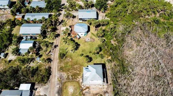 an aerial view of beach and ocean