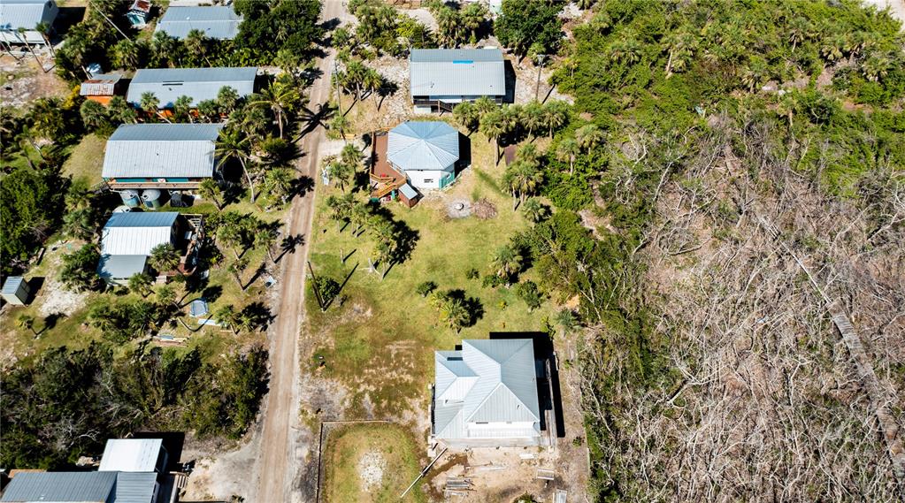 8864 Bay Street Boca Grande, FL 33921 - Photo 11 of 25 an aerial view of residential house with parking space
