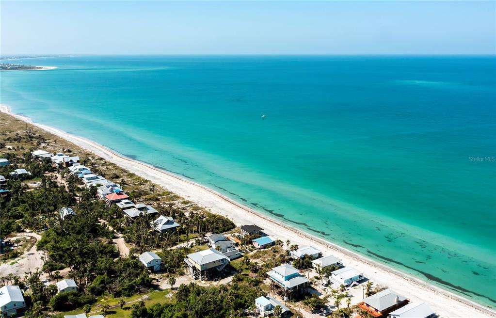 8864 Bay Street Boca Grande, FL 33921 - Photo 20 of 25 a view of an ocean from a balcony