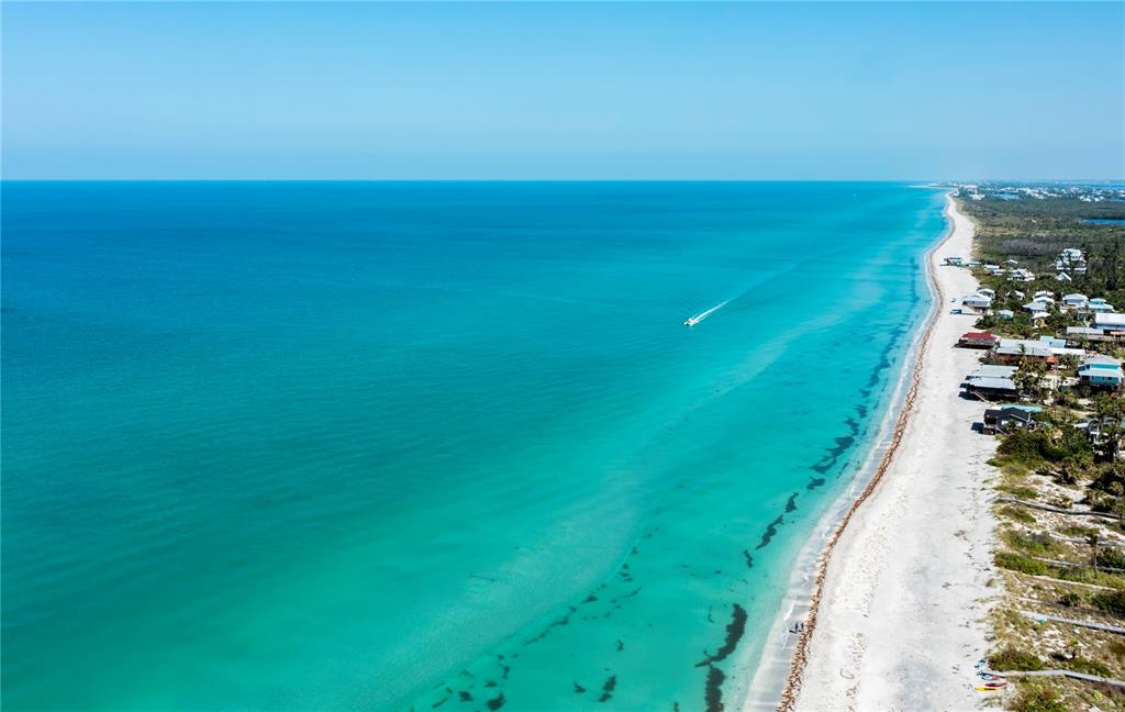 8864 Bay Street Boca Grande, FL 33921 - Photo 21 of 25 a view of an ocean from a balcony