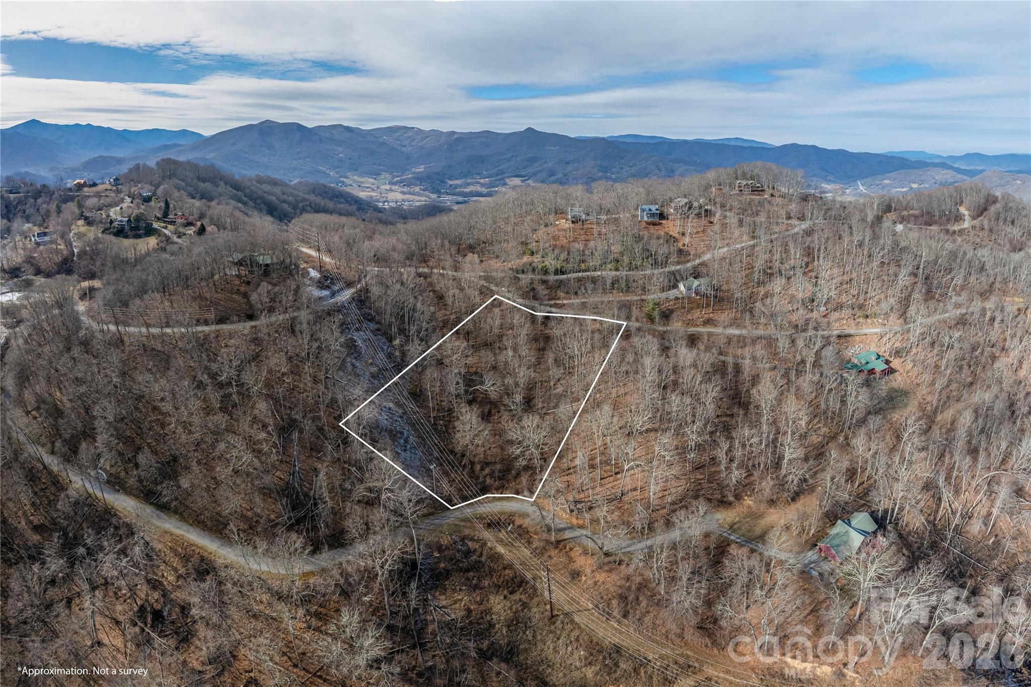 0 Utah Mountain Road, Unit 25 Waynesville, NC 28785 - Photo 2 of 7 a view of a city with mountains in the background
