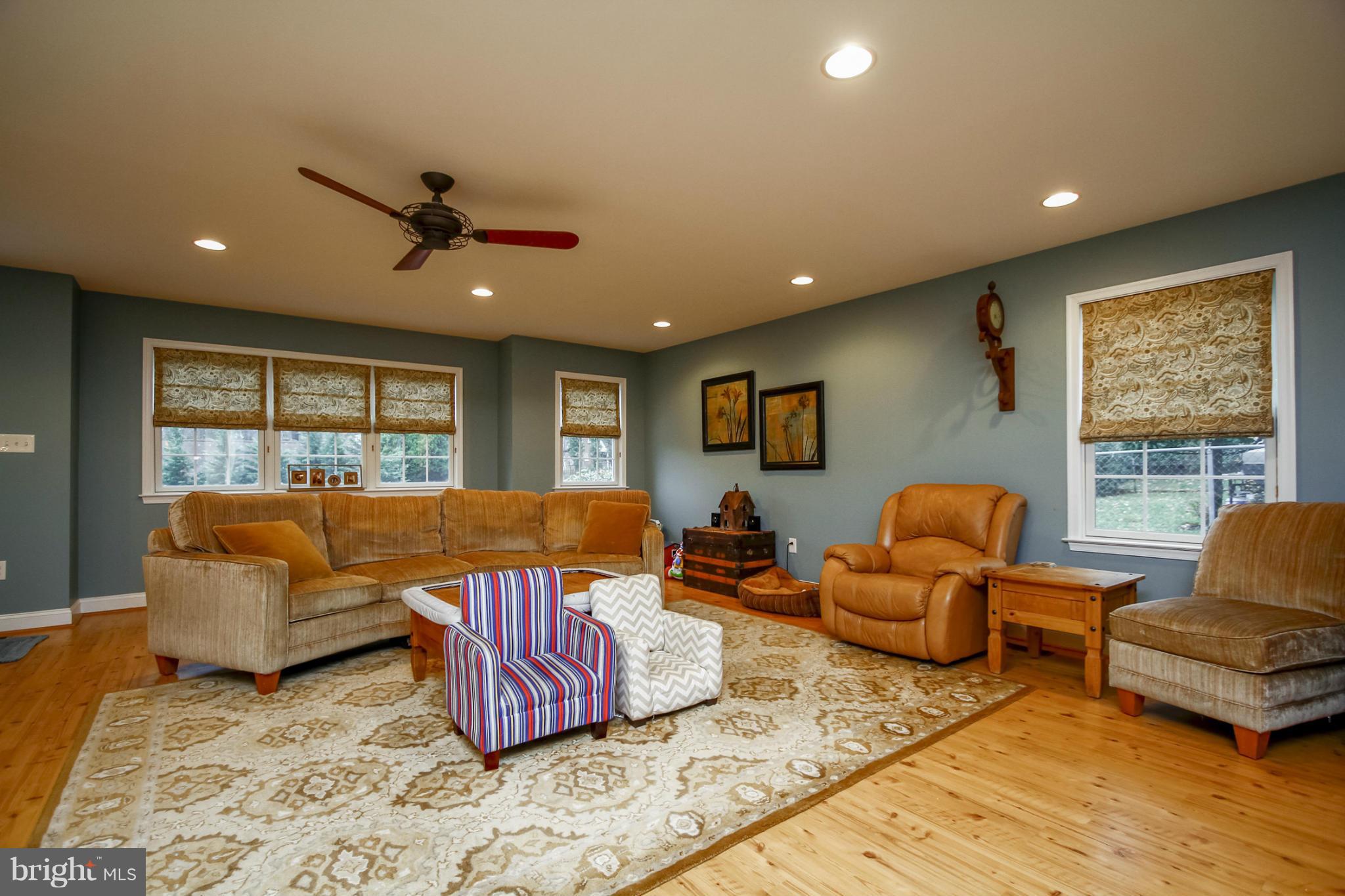 929 Litchfield Road Baltimore, MD 21239 - Photo 4 of 29 a living room with furniture and a large window
