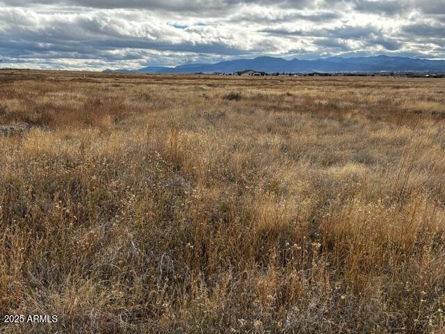 10211 East Silent River Road, Unit 45 Prescott Valley, AZ 86315 - Photo 12 of 15 a view of an ocean and beach