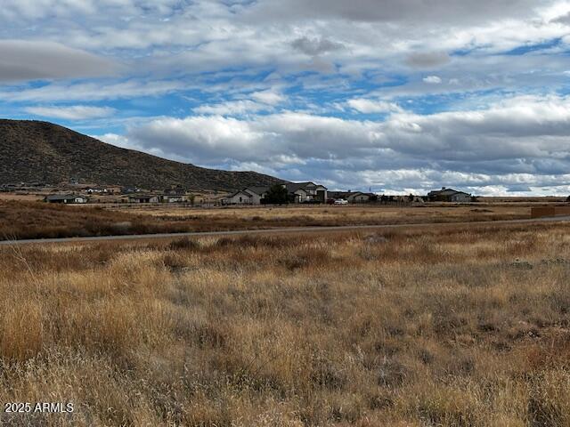10211 East Silent River Road, Unit 45 Prescott Valley, AZ 86315 - Photo 2 of 15 a view of a lake with a city