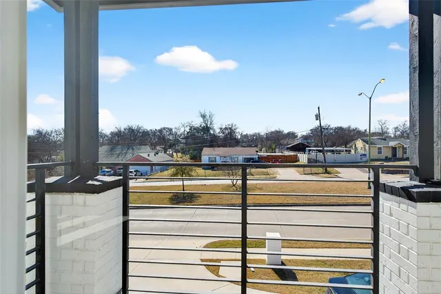 a view of a balcony with a ocean view