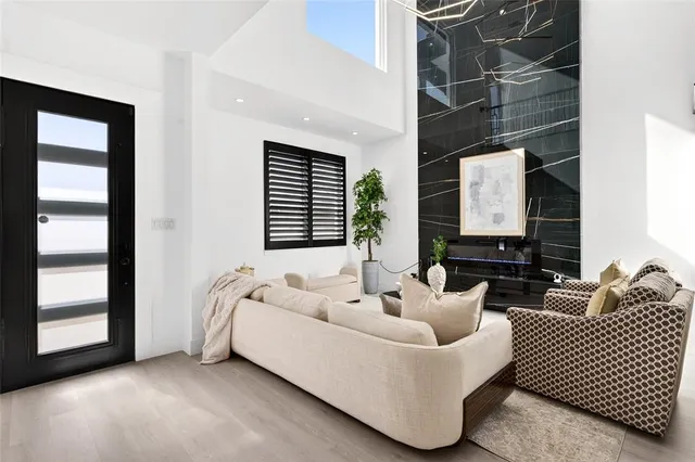 a living room with furniture and window