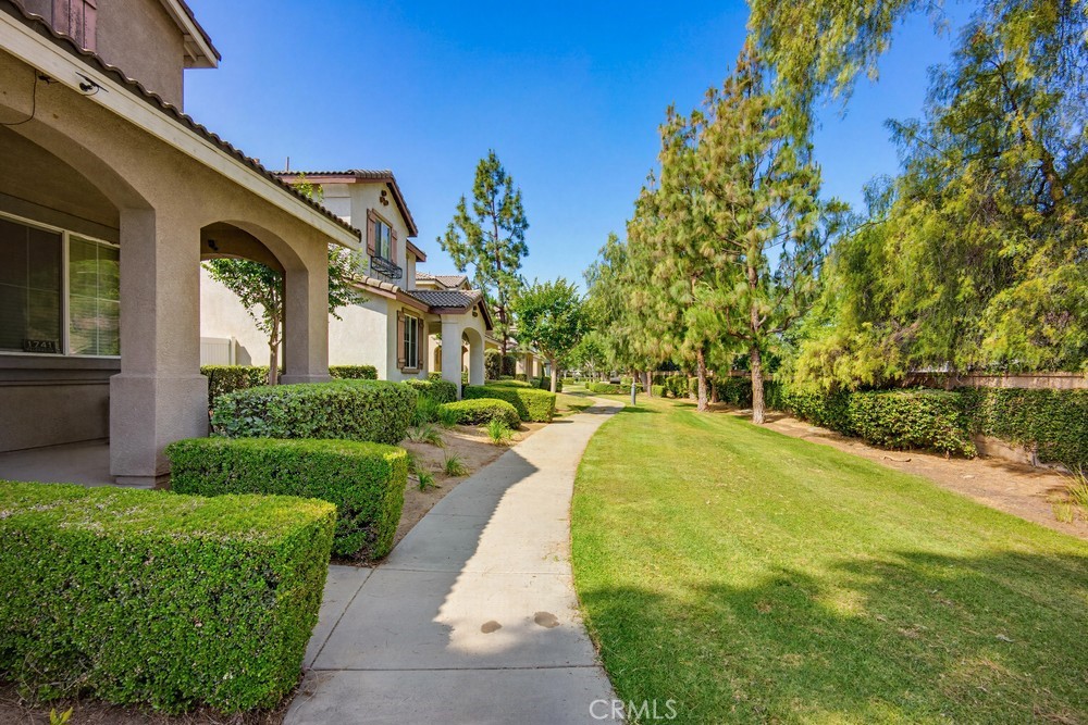 1747 Palermo Drive Riverside, CA 92507 - Photo 5 of 30 a house with swimming pool in front of it