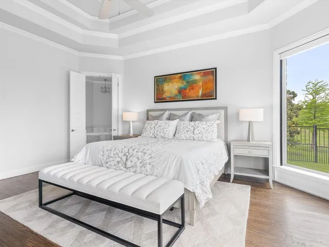 a spacious bathroom with a granite countertop sink and a mirror