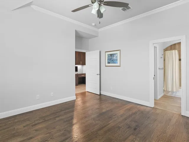a living room with fireplace furniture and a flat screen tv