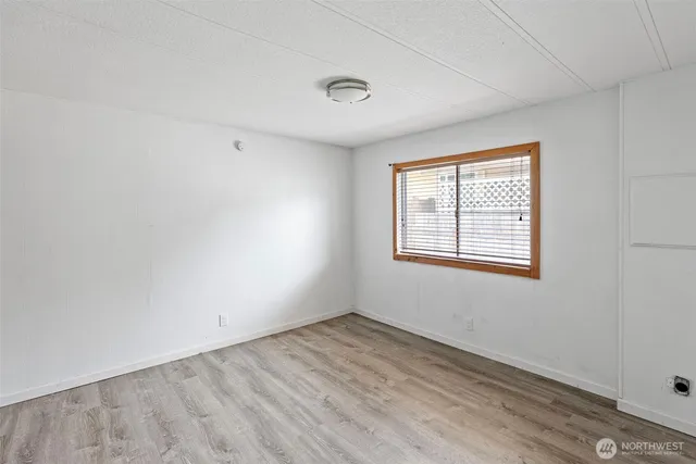 a bathroom with a sink a mirror and a shower