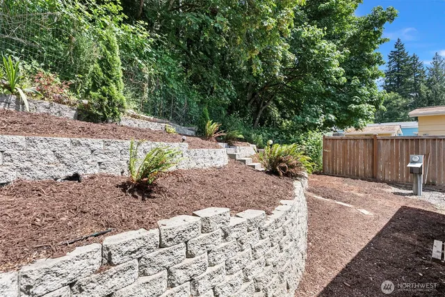 a view of a back yard of the house