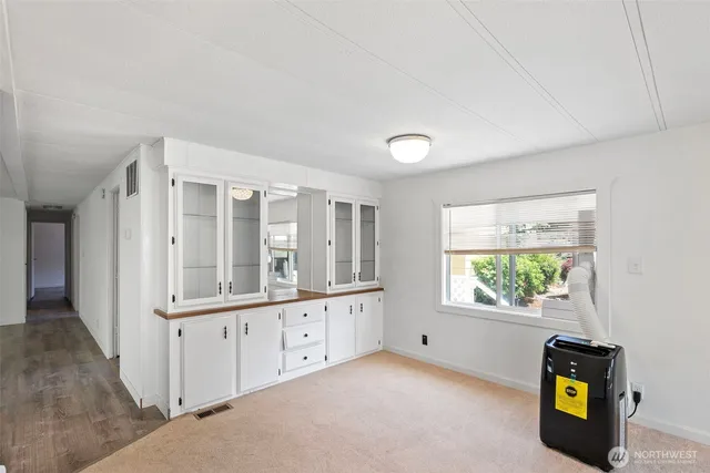 an empty room with windows