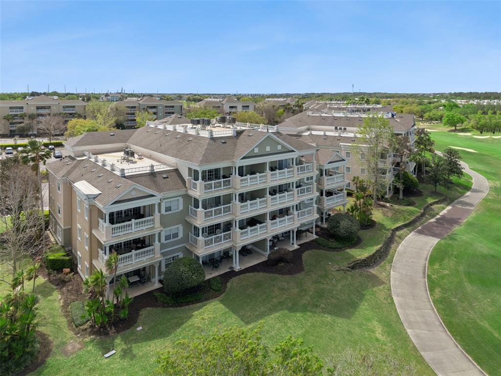 1352 Centre Ct Ridge Drive, Unit 302 Reunion, FL 34747 - Photo 15 of 42 a view of a city with tall buildings