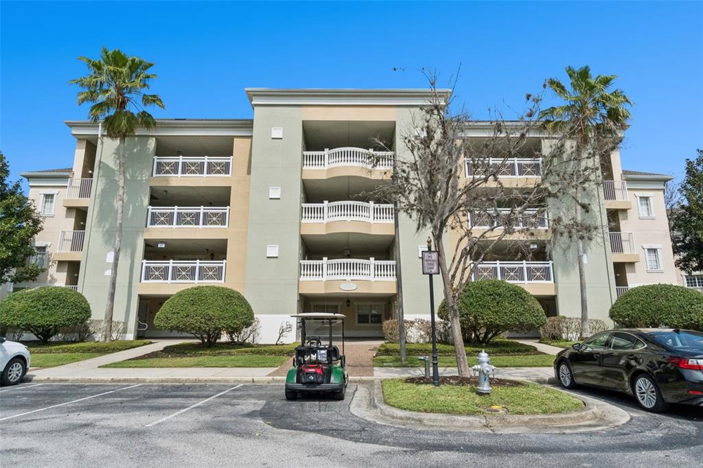 1352 Centre Ct Ridge Drive, Unit 302 Reunion, FL 34747 - Photo 2 of 42 a front view of a building with street view