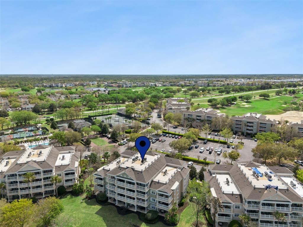 1352 Centre Ct Ridge Drive, Unit 302 Reunion, FL 34747 - Photo 22 of 42 an aerial view of multiple house