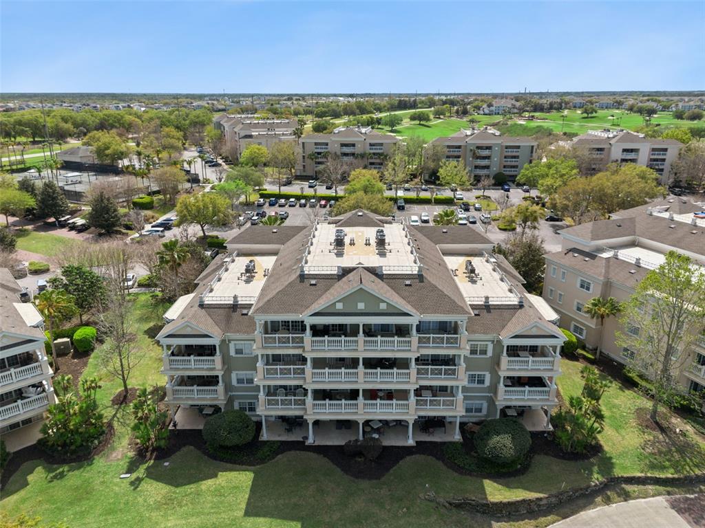 1352 Centre Ct Ridge Drive, Unit 302 Reunion, FL 34747 - Photo 24 of 42 a view of a city with tall buildings