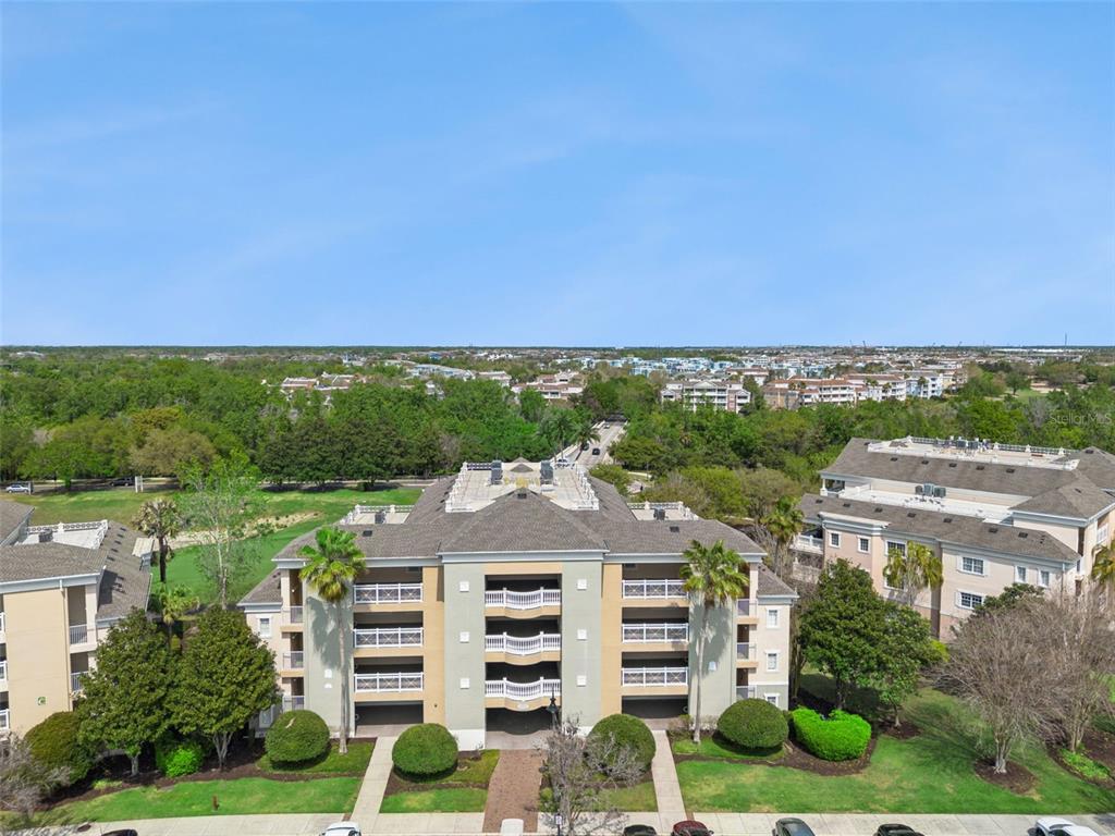1352 Centre Ct Ridge Drive, Unit 302 Reunion, FL 34747 - Photo 27 of 42 an aerial view of a city