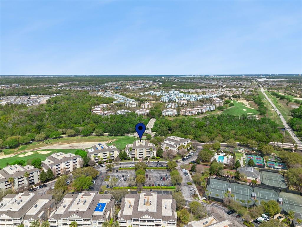 1352 Centre Ct Ridge Drive, Unit 302 Reunion, FL 34747 - Photo 36 of 42 a view of a city with an ocean view