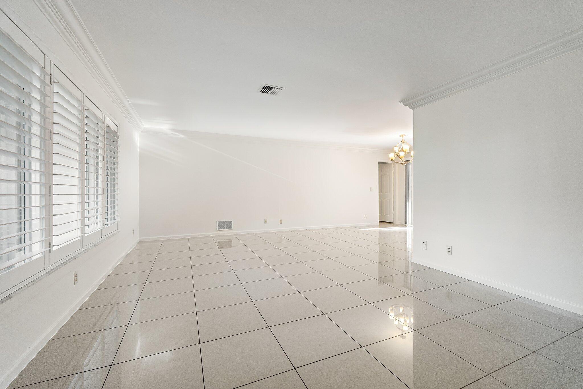 18799 Rio Vista Drive Jupiter, FL 33469 - Photo 17 of 58 a view of an empty room with a window