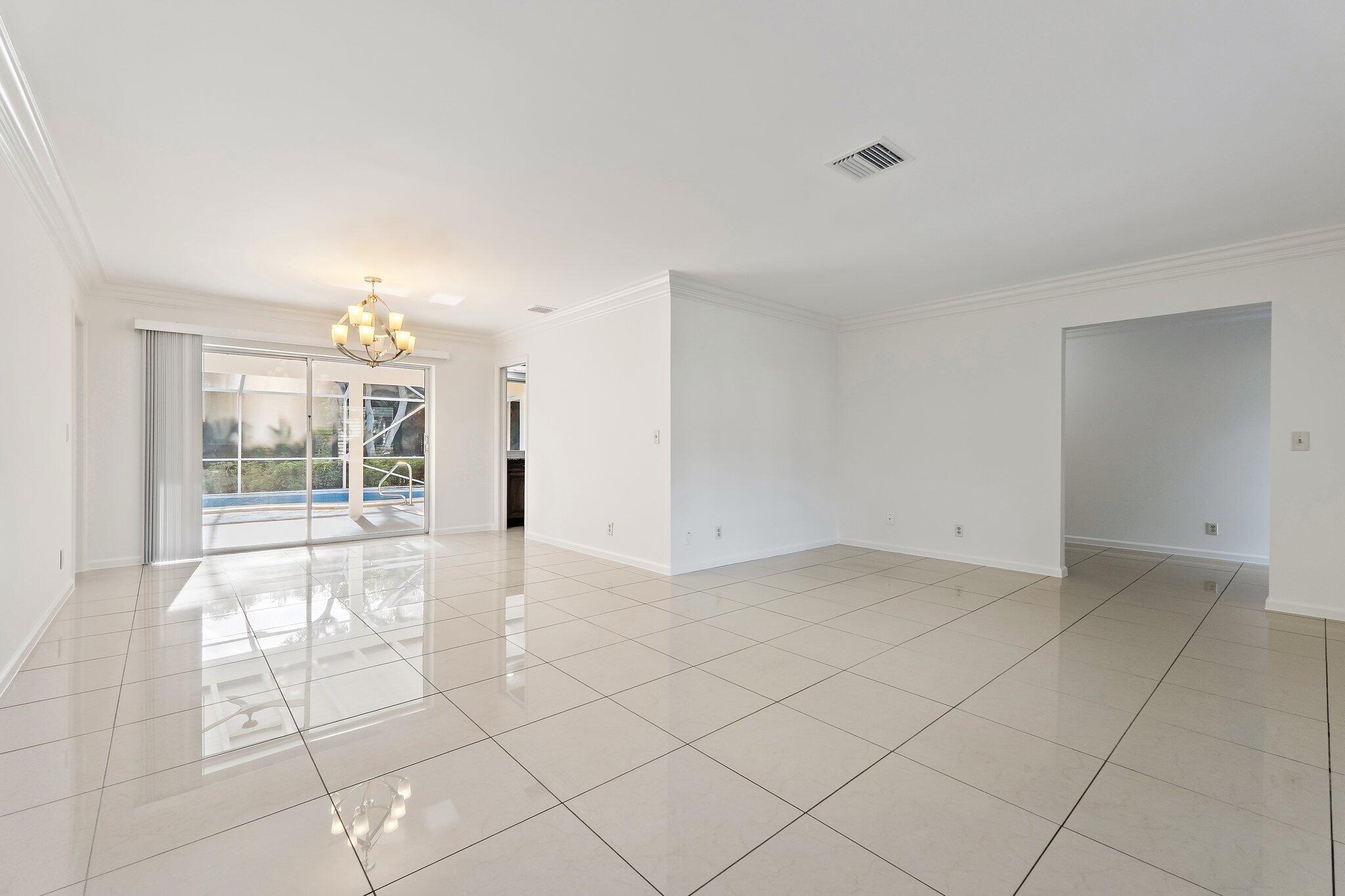 18799 Rio Vista Drive Jupiter, FL 33469 - Photo 18 of 58 a view of an empty room with a window