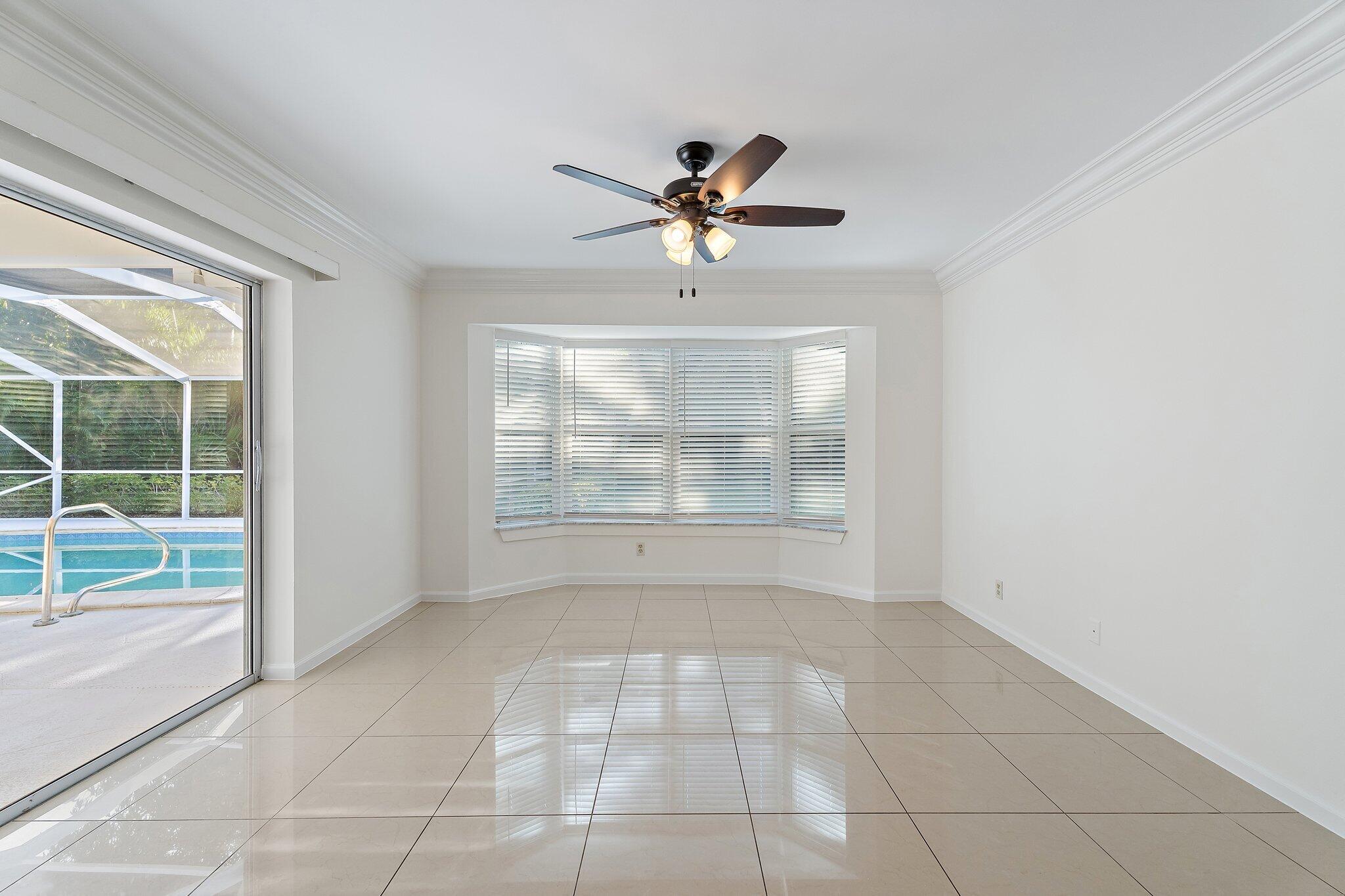 18799 Rio Vista Drive Jupiter, FL 33469 - Photo 29 of 58 a view of an empty room with a window