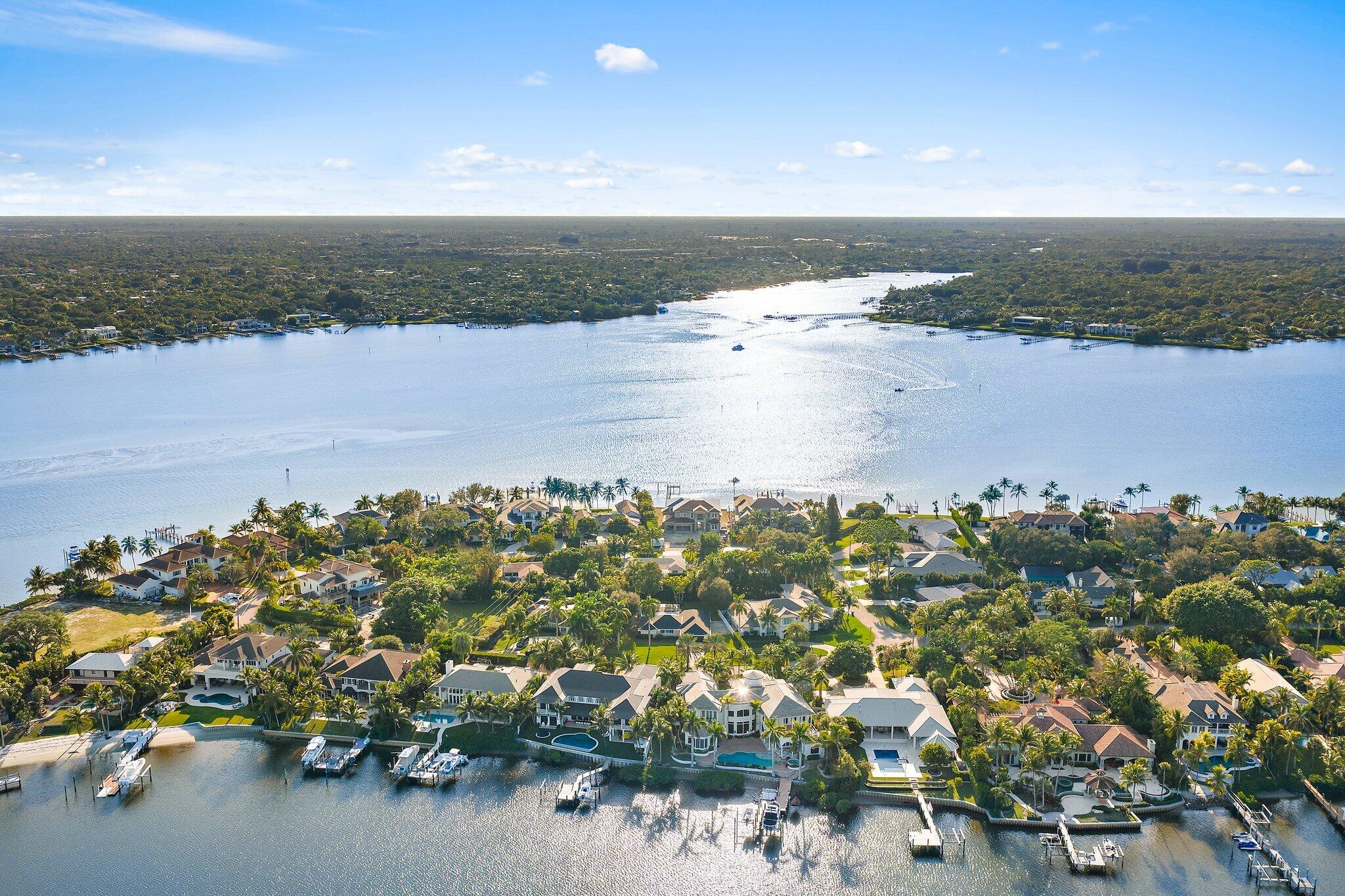 18799 Rio Vista Drive Jupiter, FL 33469 - Photo 3 of 58 a view of lake with beach