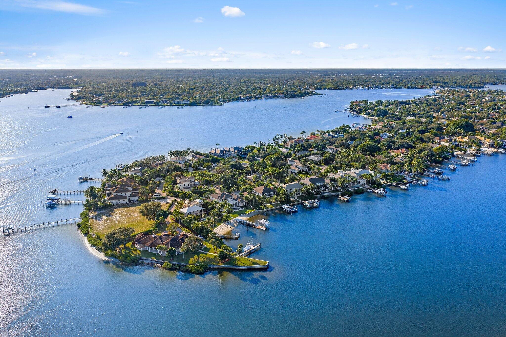 18799 Rio Vista Drive Jupiter, FL 33469 - Photo 56 of 58 an aerial view of a houses with a lake view