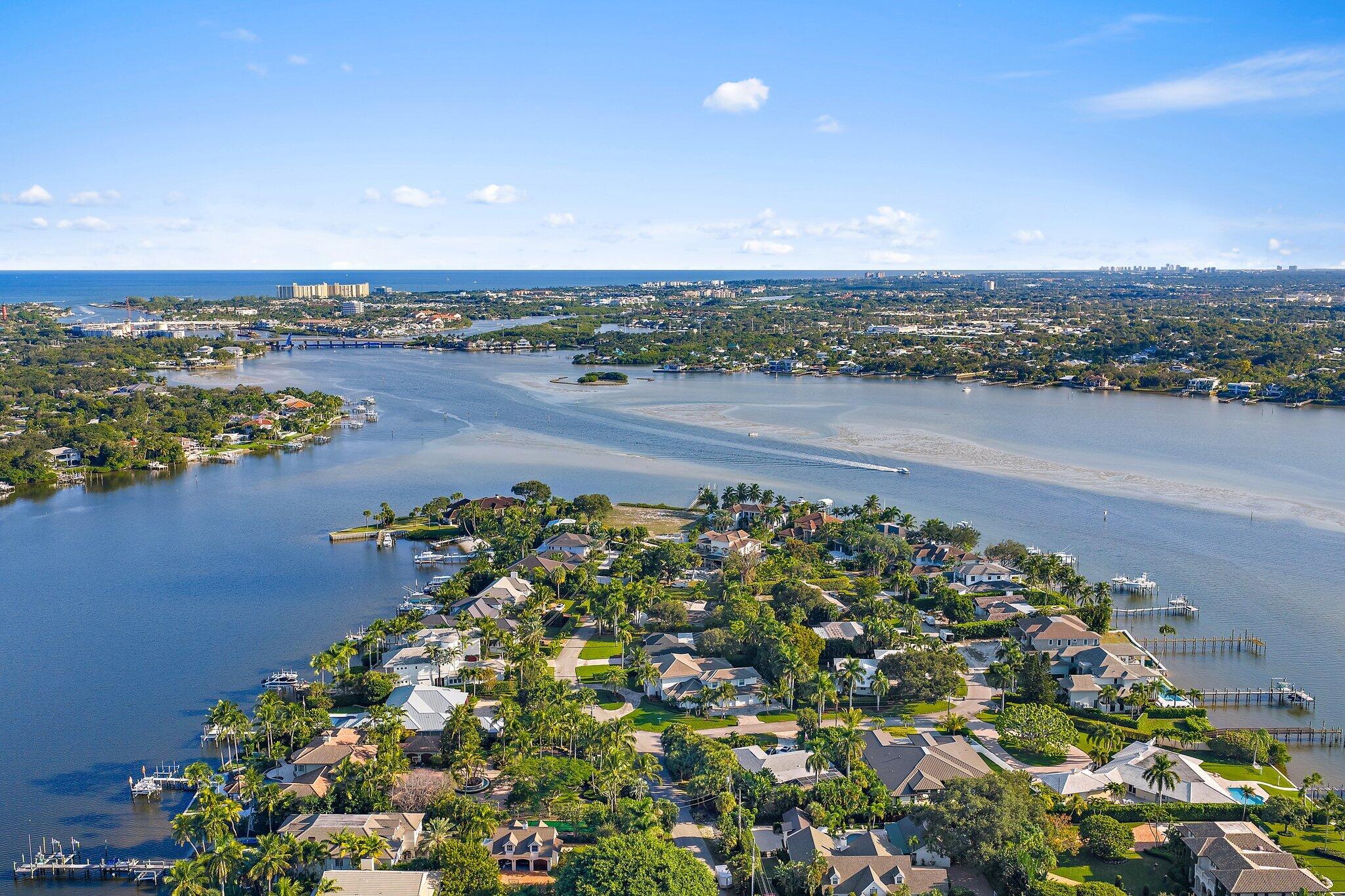 18799 Rio Vista Drive Jupiter, FL 33469 - Photo 58 of 58 an aerial view of a golf course with a lake view
