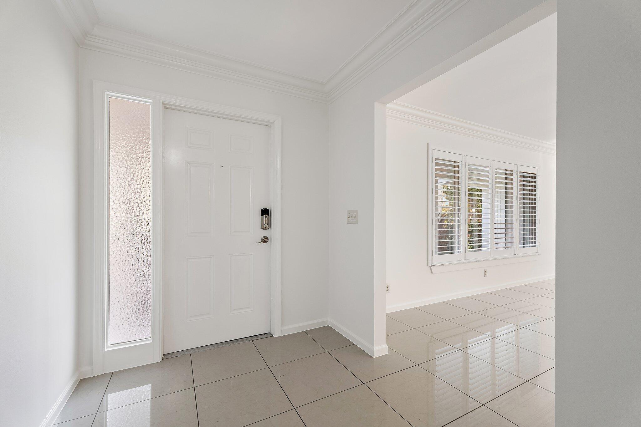 18799 Rio Vista Drive Jupiter, FL 33469 - Photo 9 of 58 a view of an empty room with window