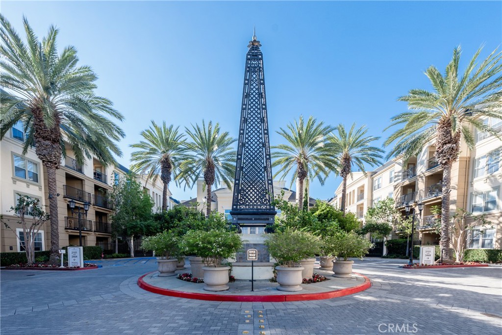 3261 Watermarke Place Irvine, CA 92612 - Photo 16 of 31 a palm tree sitting in front of a building