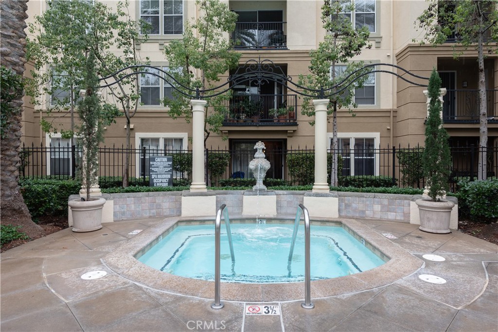 3261 Watermarke Place Irvine, CA 92612 - Photo 23 of 31 a view of a building with potted plants