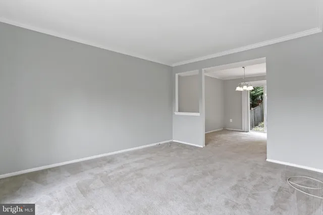 a view of an empty room and window