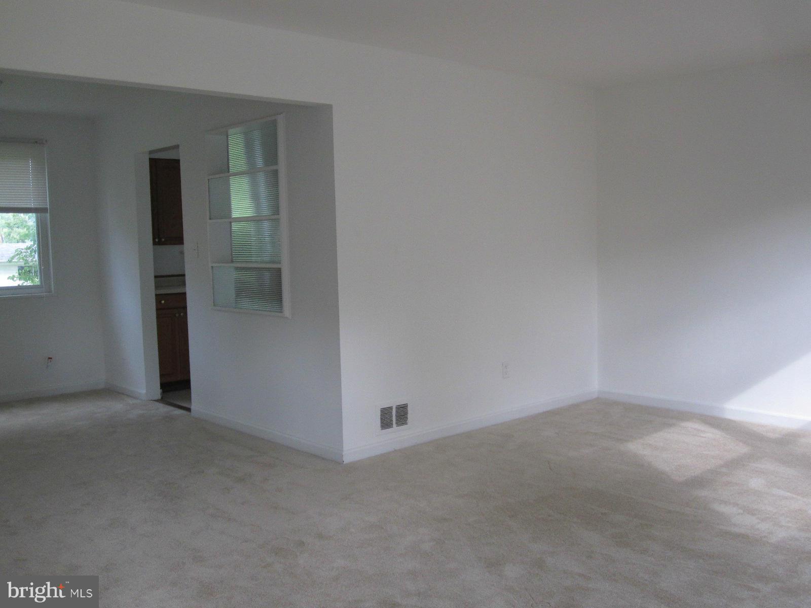 12802 Crisfield Road Silver Spring, MD 20906 - Photo 5 of 16 Living Room Dining Room