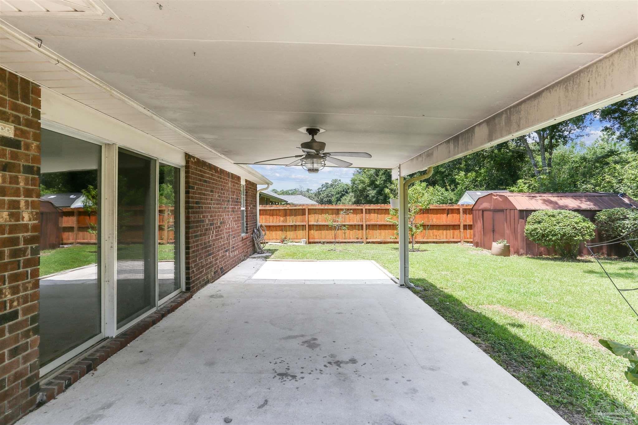 1062 Joaquin Road Pensacola, FL 32506 - Photo 41 of 42 a view of a backyard