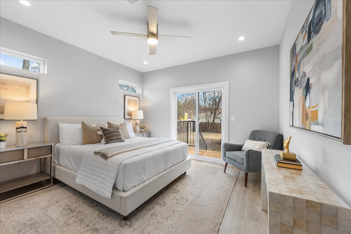1149 Ebert Avenue, Unit D Austin, TX 78721 - Photo 11 of 34 Bedroom featuring access to exterior, a ceiling fan, recessed lighting, and light wood finished floors