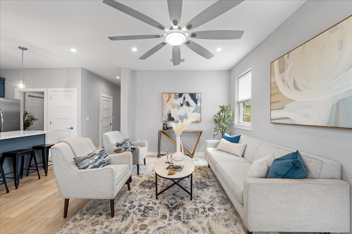 1149 Ebert Avenue, Unit D Austin, TX 78721 - Photo 19 of 34 Living room with recessed lighting, light wood-style floors, and ceiling fan