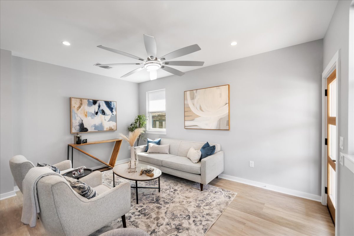 1149 Ebert Avenue, Unit D Austin, TX 78721 - Photo 20 of 34 Living room featuring light wood-style flooring, recessed lighting, and ceiling fan