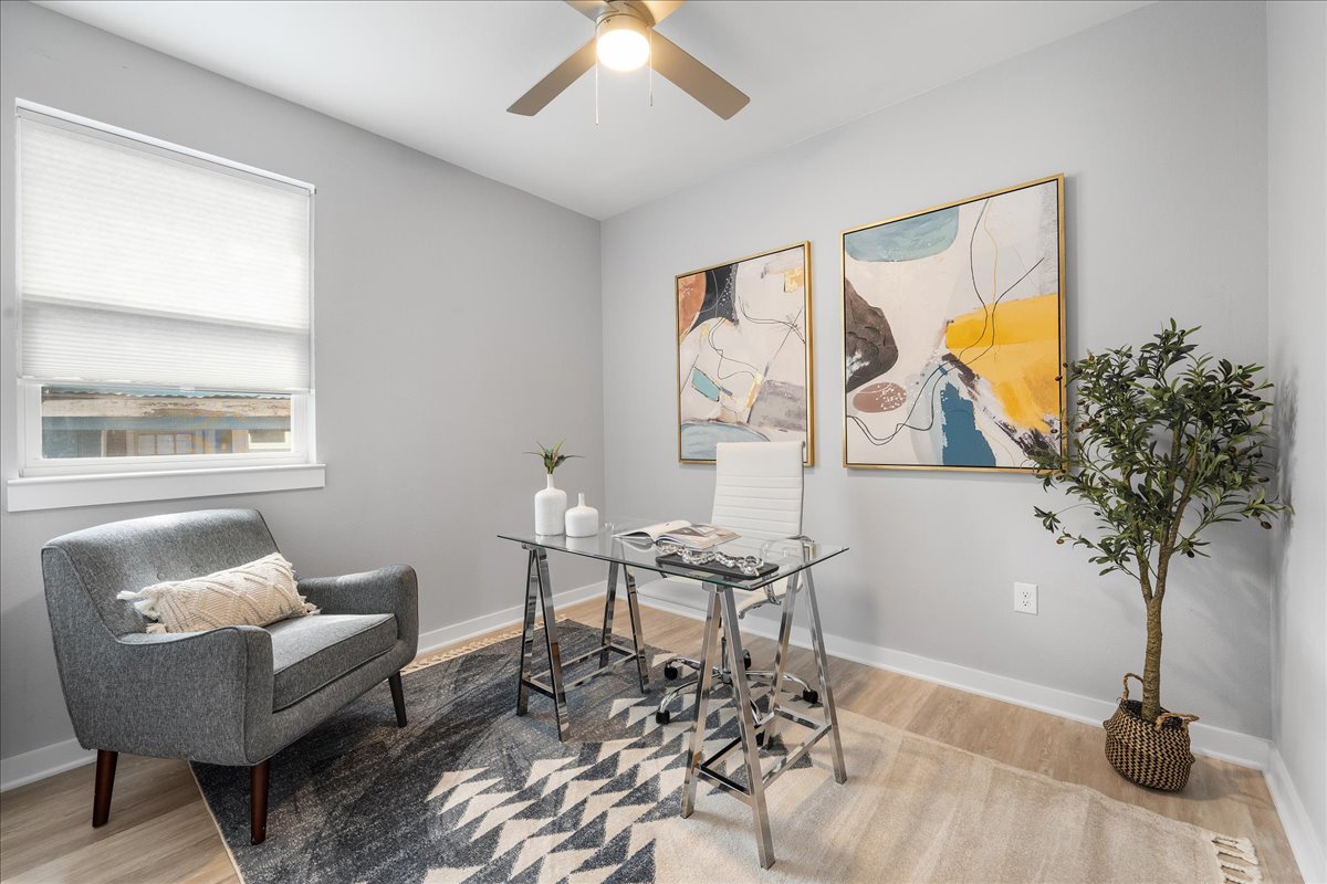1149 Ebert Avenue, Unit D Austin, TX 78721 - Photo 26 of 34 Home office with ceiling fan and light wood-style flooring