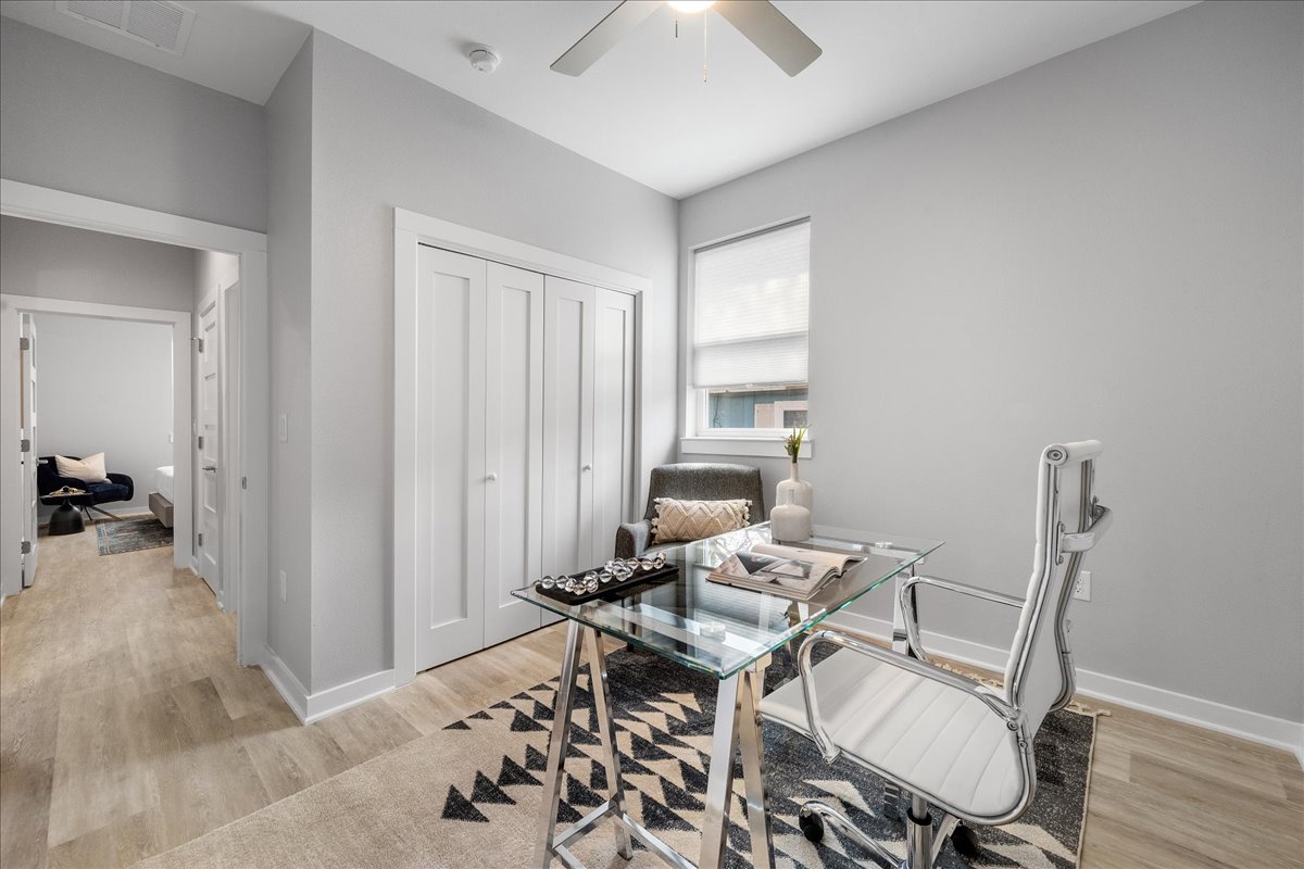 1149 Ebert Avenue, Unit D Austin, TX 78721 - Photo 27 of 34 Office featuring light wood-type flooring and a ceiling fan
