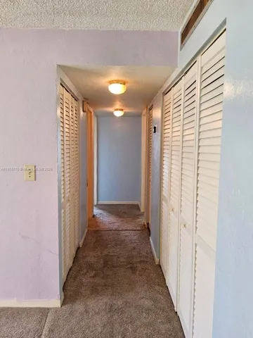 a view of a hallway with a elevator