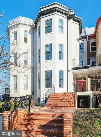 a front view of a building with glass windows