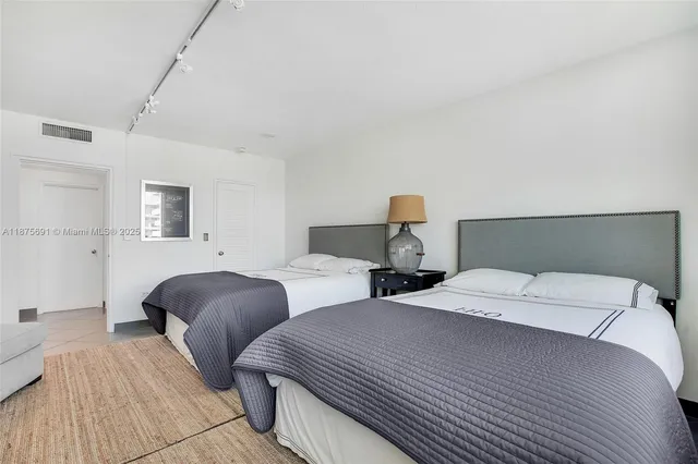 a view of balcony with wooden floor