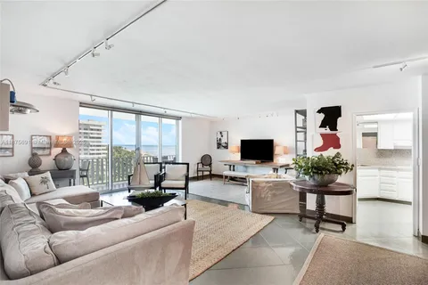 a living room with furniture or couch and a flat screen tv