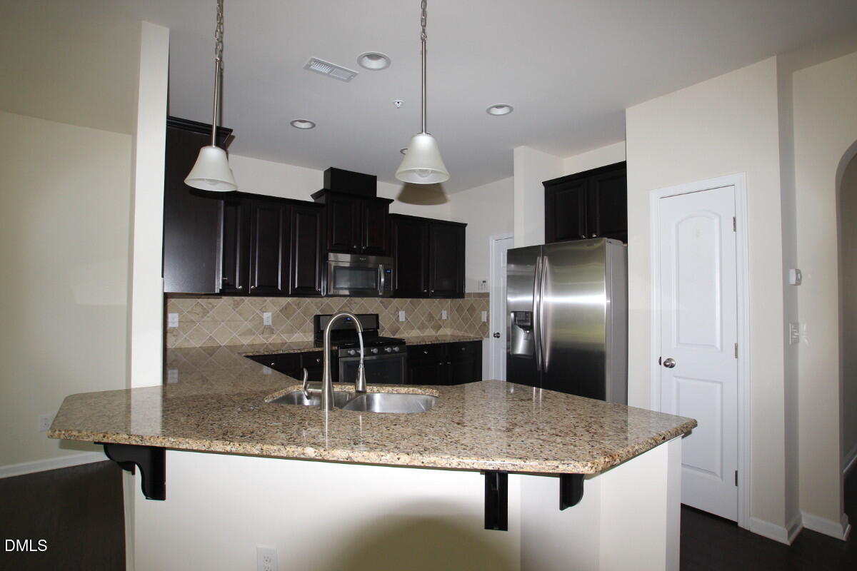 10019 Lynnberry Place Raleigh, NC 27617 - Photo 4 of 15 kitchen3